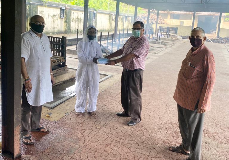 BJP Medical Cell distributes PPE to caretaker of Hindu Crematorium at Margao