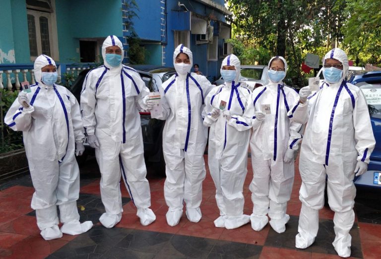 Vote first: Amarnath Panajikar, family cast vote donning PPE kit