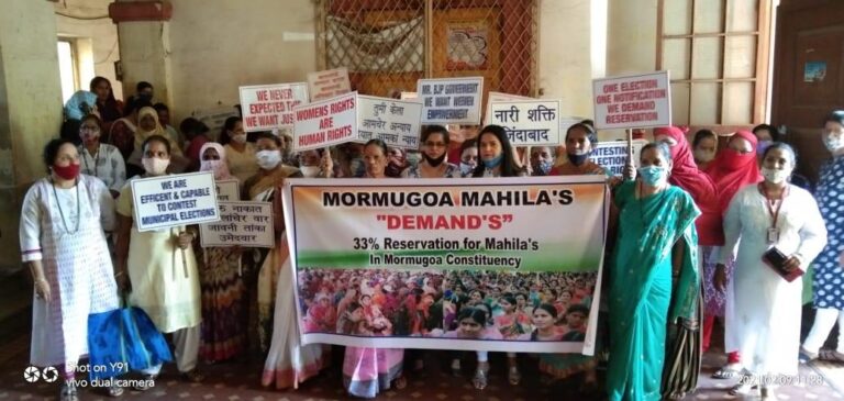 Congress women agitate in MMC over reservations for civic polls, inked the photo of UD Minister Milind Naik in protest. Demand restructuring of reservations